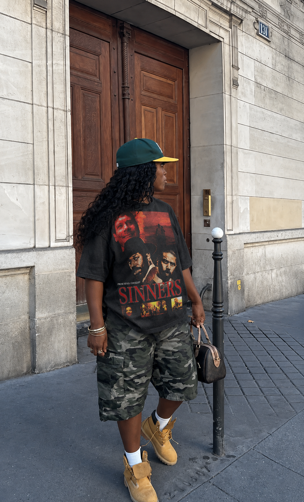 Model wearing the Sinners tee